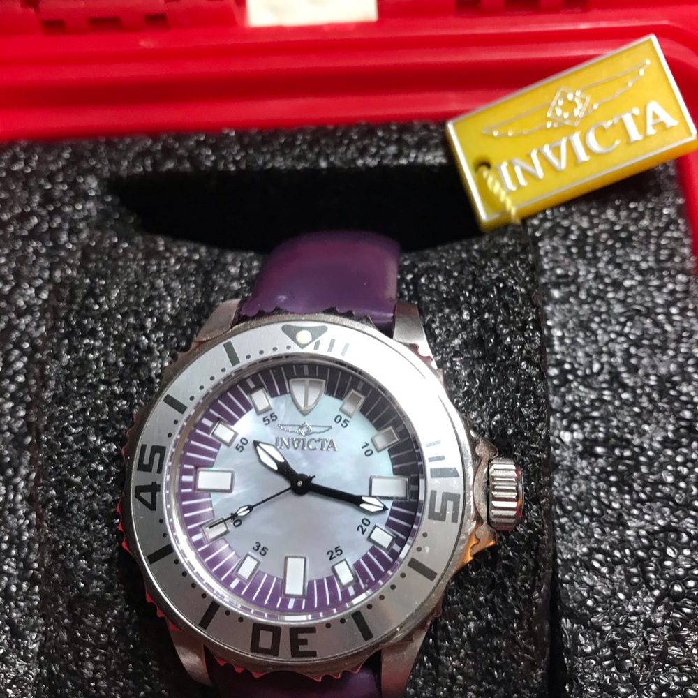Invicta pro diver 100 meters women’s watch.